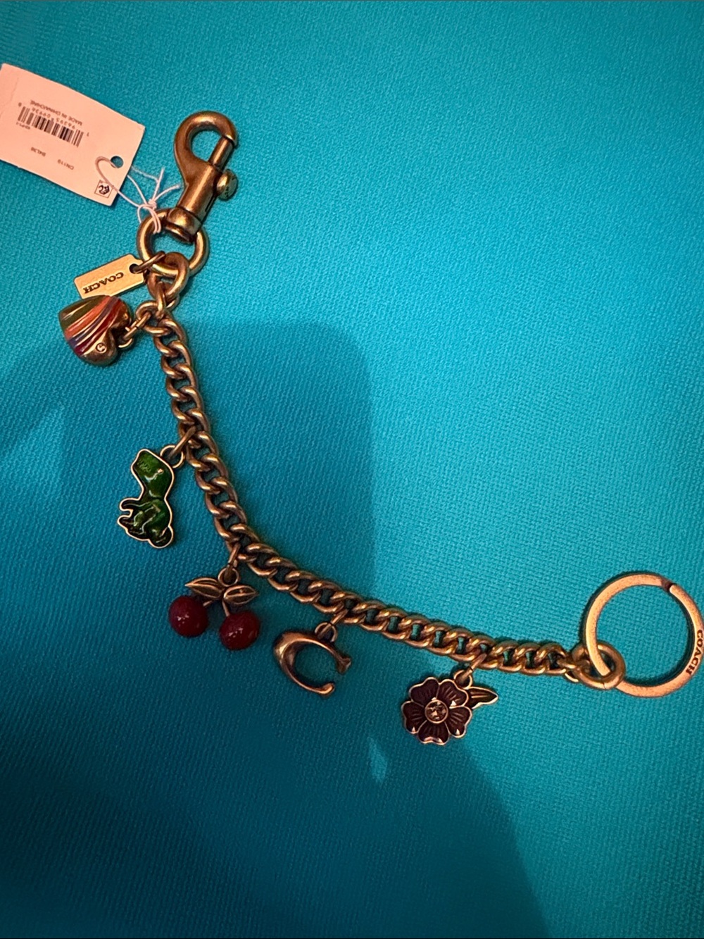 Coach Gold-Tone Charm handbag accessory with Red Cherry and Green Enamel Charms
